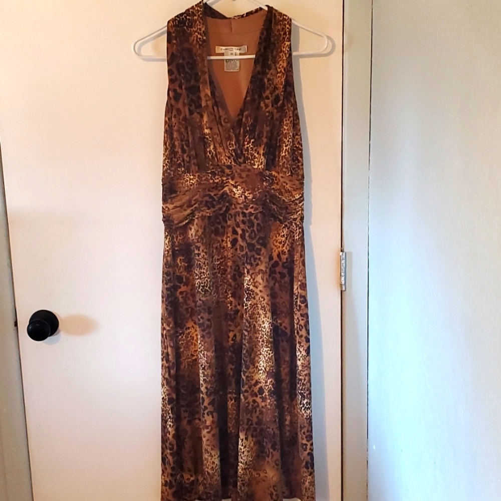 Cheetah print dress size 12. Lots of stretch and longer length.